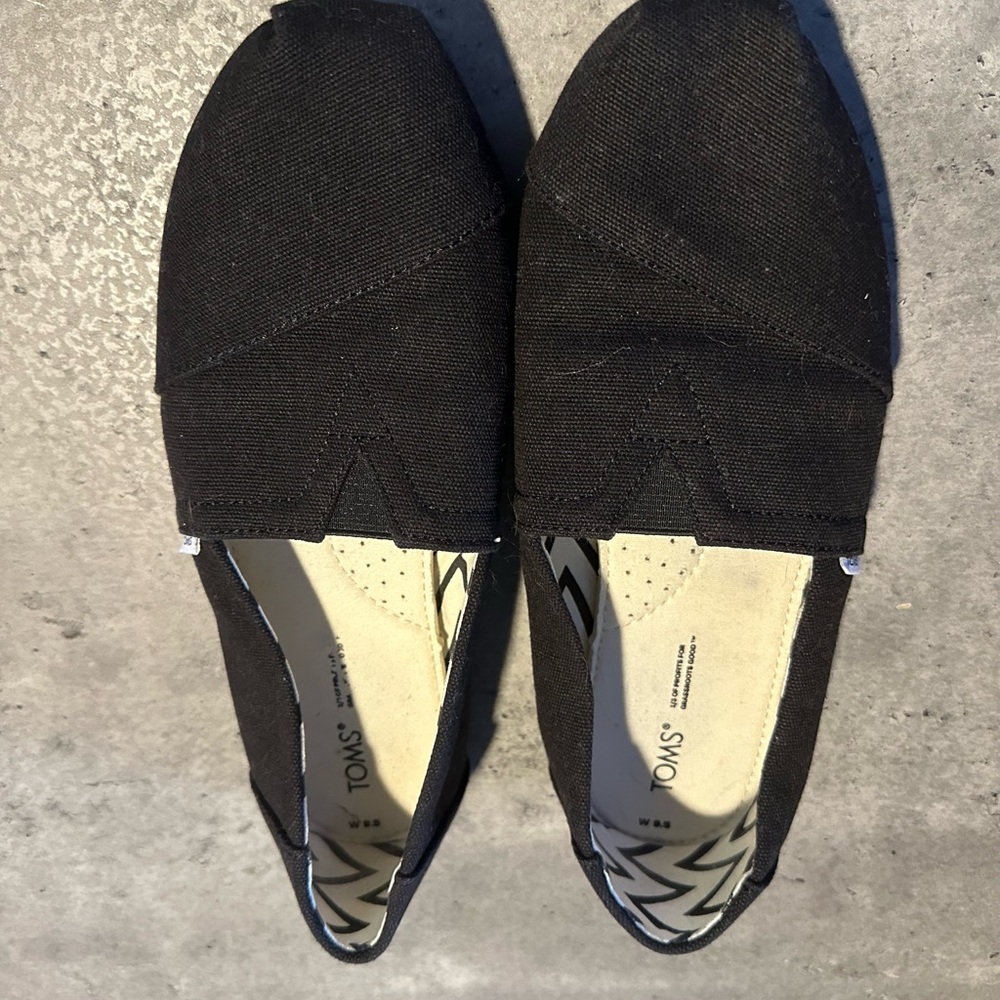 TOMS Classic Black Canvas Slip-Ons